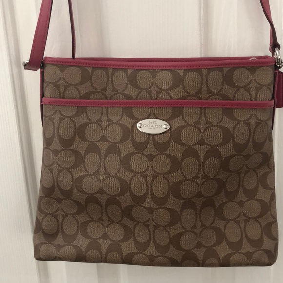 Coach Handbags - Coach cross body pink lined, EUC s